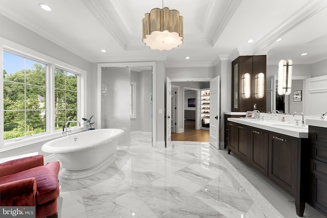 717 Miller Ave, Great Falls, VA 22066 - bathroom with vanity, a soaking tub, ornamental molding, recessed lighting, and marble tiled flooring