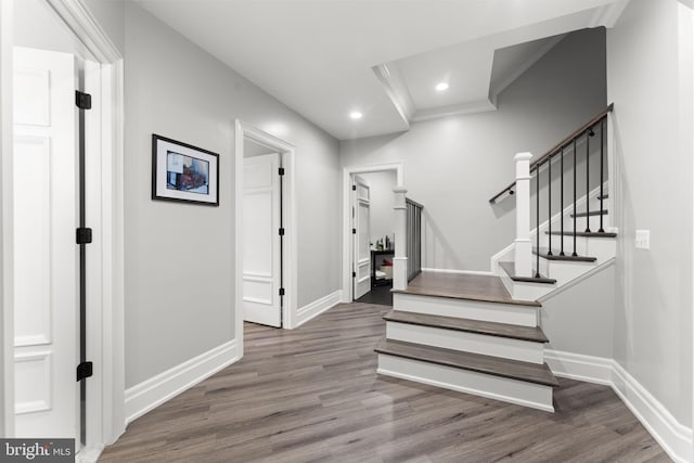 717 Miller Ave, Great Falls, VA 22066 - stairway featuring wood finished floors, recessed lighting, and ornamental molding
