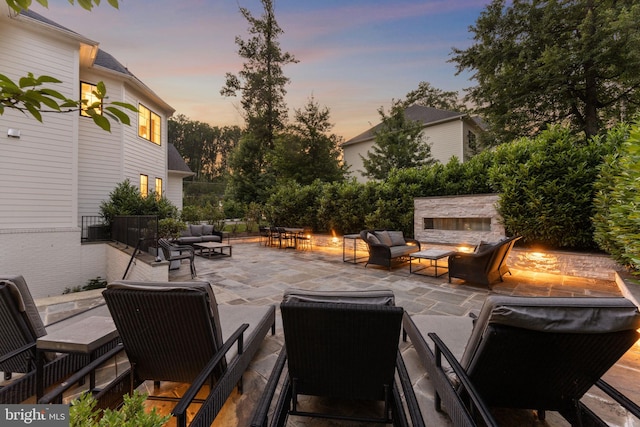 717 Miller Ave, Great Falls, VA 22066 - view of patio with an outdoor living space with a fire pit