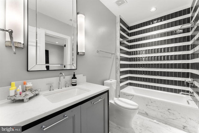 717 Miller Ave, Great Falls, VA 22066 - full bath featuring vanity, marble look tile flooring, and a combined bath / shower with marble appearance