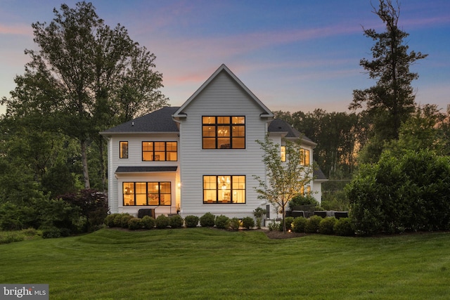 717 Miller Ave, Great Falls, VA 22066 - back of property at dusk with a yard