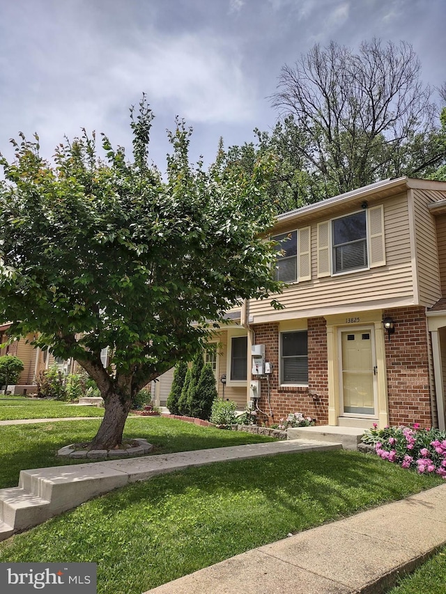 13825 Palmer House Way Unit 32-237, Silver Spring, MD 20904 - multi unit property with brick siding and a front lawn
