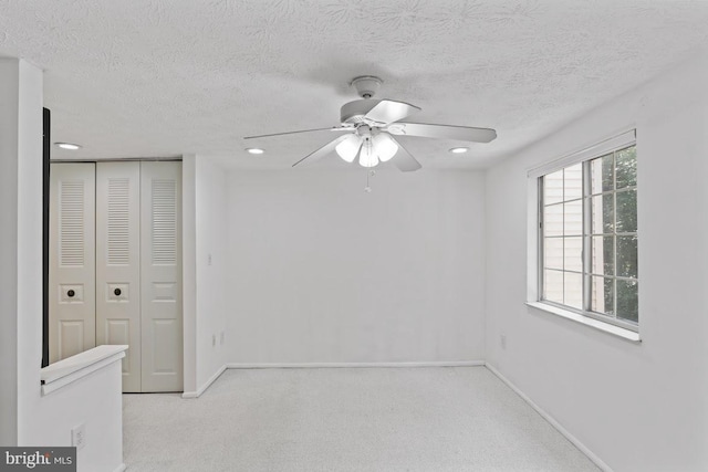 13825 Palmer House Way Unit 32-237, Silver Spring, MD 20904 - unfurnished bedroom featuring a textured ceiling, carpet, a closet, recessed lighting, and a ceiling fan