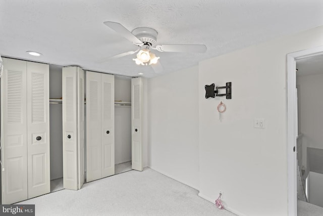 13825 Palmer House Way Unit 32-237, Silver Spring, MD 20904 - unfurnished bedroom with two closets, light colored carpet, recessed lighting, and ceiling fan