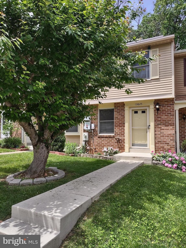13825 Palmer House Way Unit 32-237, Silver Spring, MD 20904 - view of front of house with a front lawn and brick siding