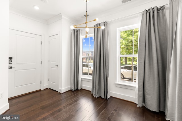7229 Georgia Ave NW Unit A, Washington, DC 20012 - unfurnished dining area with dark wood-style floors and baseboards