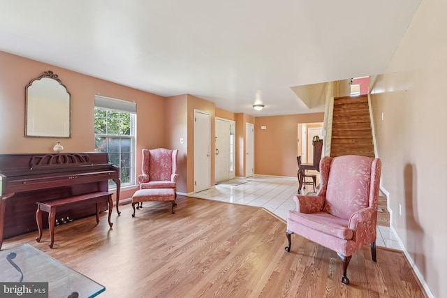 3 Prickett Ln, Hainesport, NJ 08036 - living area featuring stairs, light wood finished floors, and baseboards
