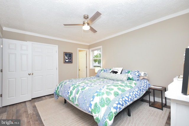 8755 Cather Ave, Manassas, VA 20110 - bedroom featuring wood finished floors, ornamental molding, a textured ceiling, and a ceiling fan