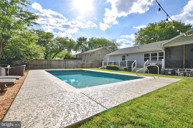 8755 Cather Ave, Manassas, VA 20110 - view of swimming pool with a sunroom, a patio area, and a wooden deck