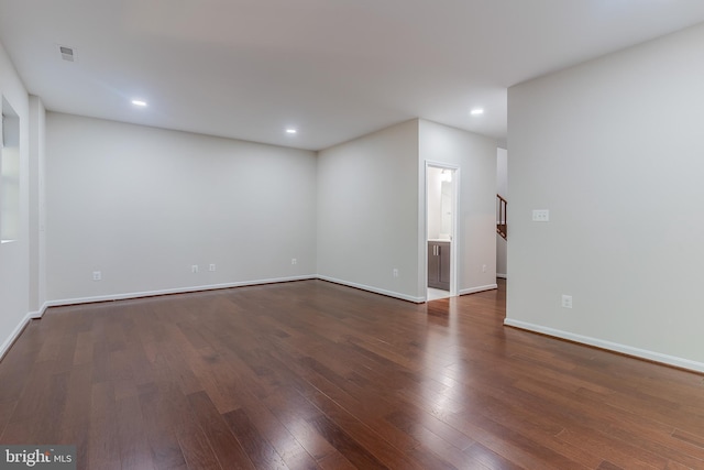 23480 Epperson Sq, Brambleton, VA 20148 - spare room featuring dark wood-style flooring, baseboards, and recessed lighting