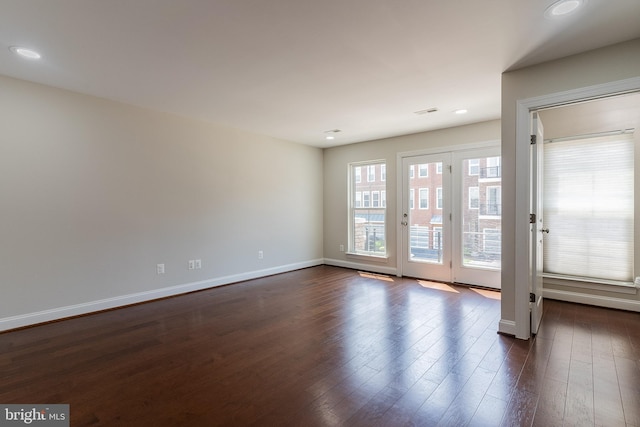 23480 Epperson Sq, Brambleton, VA 20148 - unfurnished room featuring baseboards, dark wood-type flooring, and recessed lighting