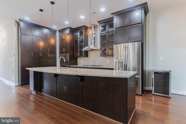 23480 Epperson Sq, Brambleton, VA 20148 - kitchen with appliances with stainless steel finishes, beverage cooler, dark wood-type flooring, and baseboards