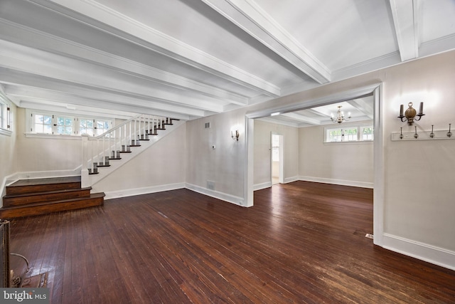 908 Edge Hill Rd, Glenside, PA 19038 - unfurnished living room featuring stairs, a chandelier, baseboards, wood-type flooring, and beamed ceiling