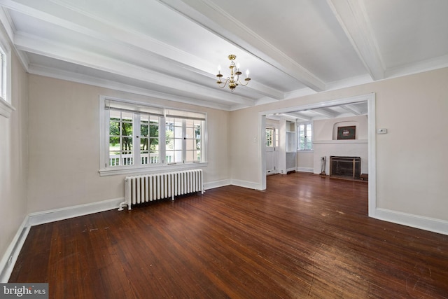 908 Edge Hill Rd, Glenside, PA 19038 - unfurnished living room with radiator heating unit, a chandelier, beam ceiling, hardwood / wood-style flooring, and a fireplace