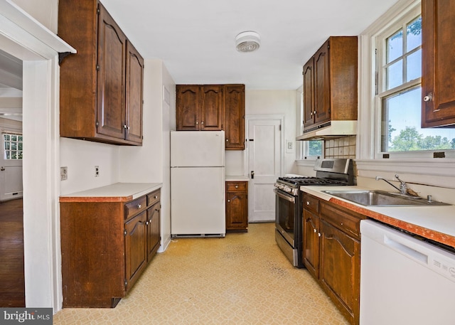 908 Edge Hill Rd, Glenside, PA 19038 - kitchen featuring white appliances, a sink, under cabinet range hood, and healthy amount of natural light