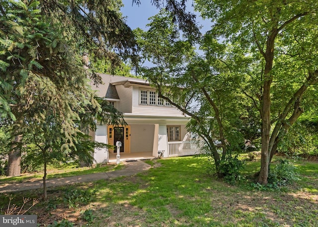 908 Edge Hill Rd, Glenside, PA 19038 - view of front of home featuring a porch and a front lawn