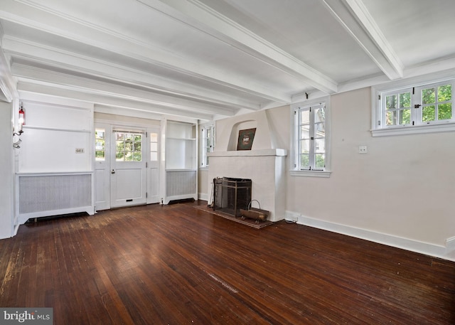 908 Edge Hill Rd, Glenside, PA 19038 - unfurnished living room featuring beam ceiling, a fireplace, wood finished floors, baseboards, and radiator heating unit