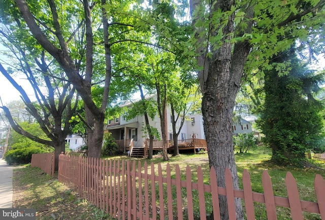 139 W Walnut St, North Wales, PA 19454 - view of front of property with a fenced front yard and a wooden deck