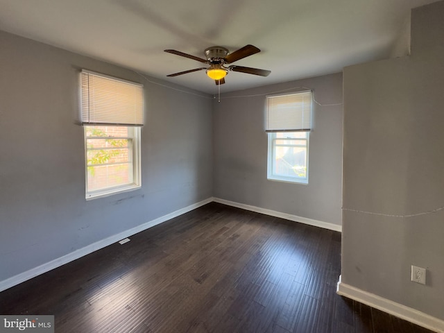 5319 Osage Ave, Philadelphia, PA 19143 - unfurnished room with plenty of natural light, a ceiling fan, baseboards, and wood finished floors