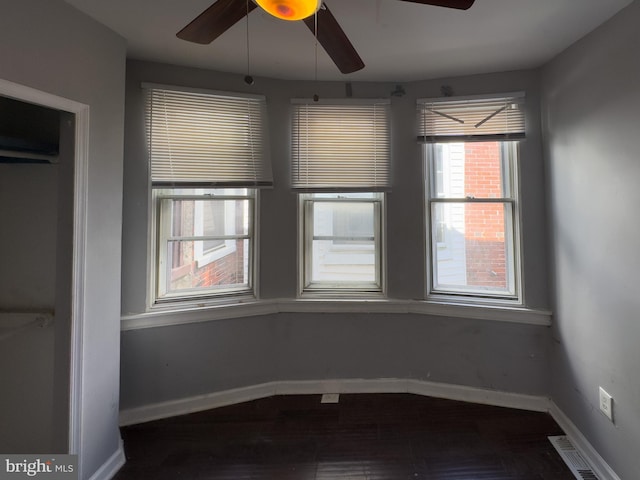 5319 Osage Ave, Philadelphia, PA 19143 - spare room with a ceiling fan, baseboards, and dark wood-style flooring