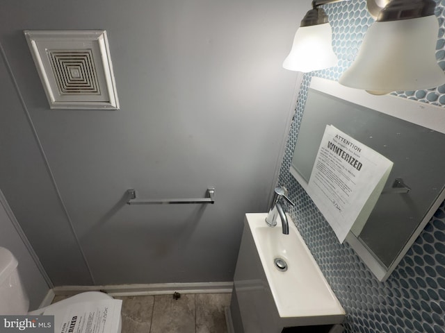 5319 Osage Ave, Philadelphia, PA 19143 - half bath featuring vanity and baseboards