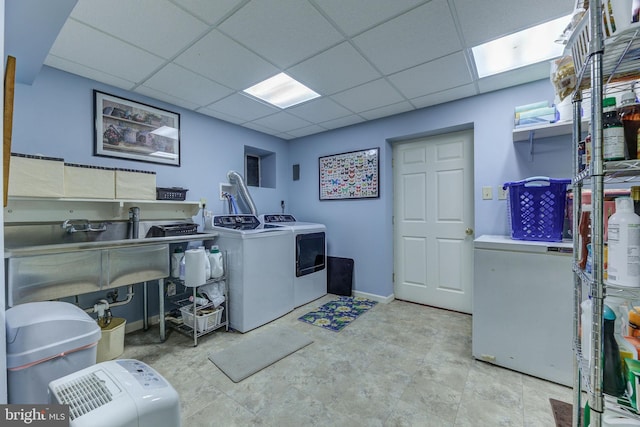 3130 Ashwood Dr, Dunkirk, MD 20754 - washroom with washing machine and dryer and baseboards