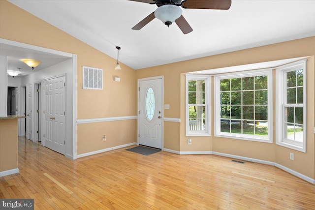 835 Campers Ln, Ruther Glen, VA 22546 - foyer featuring light wood finished floors, vaulted ceiling, baseboards, and ceiling fan