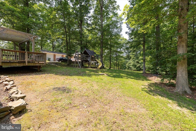 835 Campers Ln, Ruther Glen, VA 22546 - view of grassy yard featuring a wooden deck and a pergola