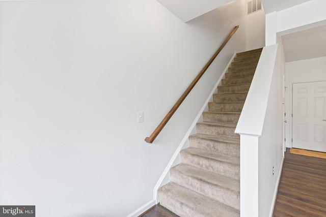 14842 Mason Creek Cir, Woodbridge, VA 22191 - staircase featuring wood finished floors and baseboards