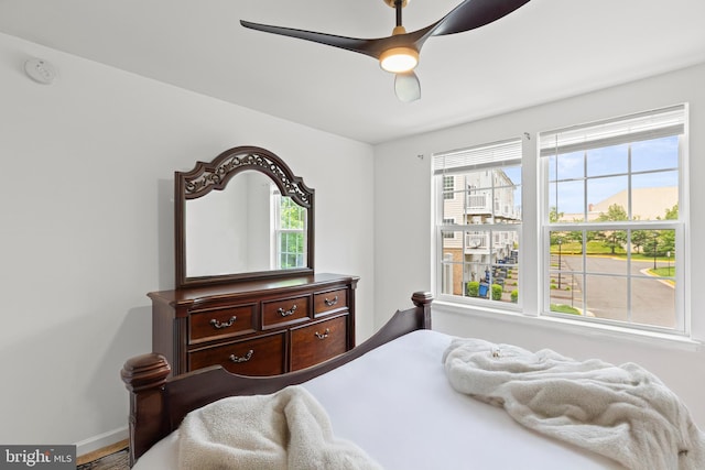 14842 Mason Creek Cir, Woodbridge, VA 22191 - bedroom with baseboards and ceiling fan