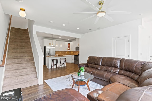 14842 Mason Creek Cir, Woodbridge, VA 22191 - living room featuring dark wood-style flooring, stairway, recessed lighting, and a ceiling fan