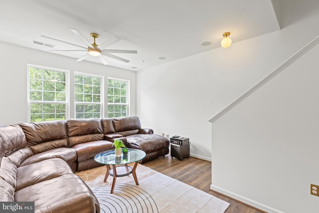 14842 Mason Creek Cir, Woodbridge, VA 22191 - living area with a ceiling fan, wood finished floors, and baseboards