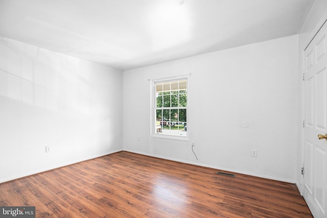 903 Bellows Ave, Fredericksburg, VA 22405 - unfurnished bedroom featuring wood finished floors and baseboards