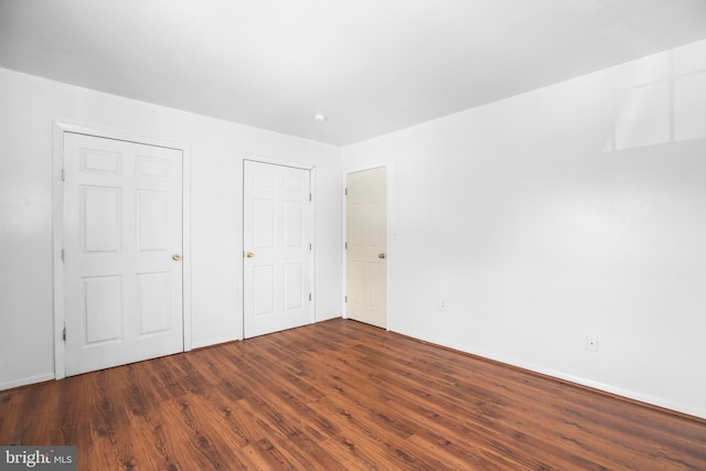 903 Bellows Ave, Fredericksburg, VA 22405 - unfurnished bedroom with wood finished floors and baseboards