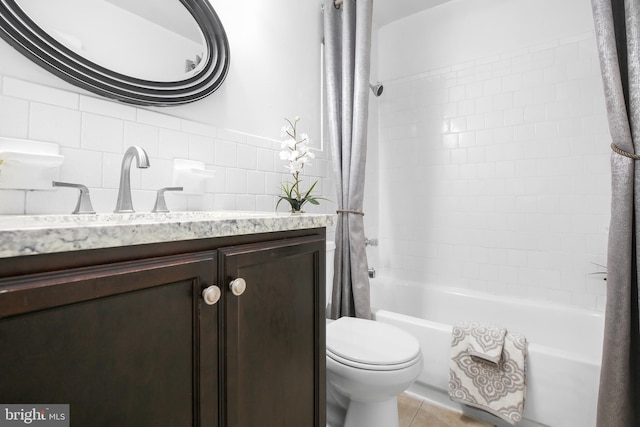 903 Bellows Ave, Fredericksburg, VA 22405 - full bath with shower / bathtub combination with curtain, vanity, toilet, tile patterned flooring, and tile walls