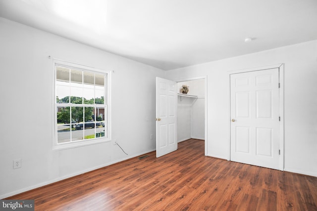 903 Bellows Ave, Fredericksburg, VA 22405 - unfurnished bedroom with wood finished floors, baseboards, and a closet