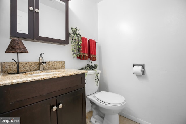 903 Bellows Ave, Fredericksburg, VA 22405 - bathroom featuring vanity, toilet, baseboards, and tile patterned flooring