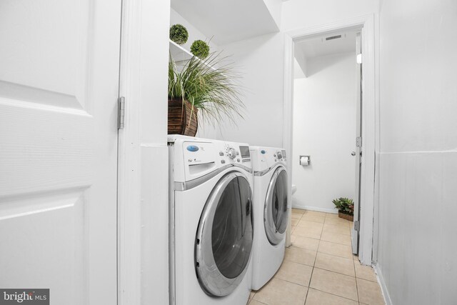 903 Bellows Ave, Fredericksburg, VA 22405 - laundry area featuring washer and clothes dryer and light tile patterned flooring