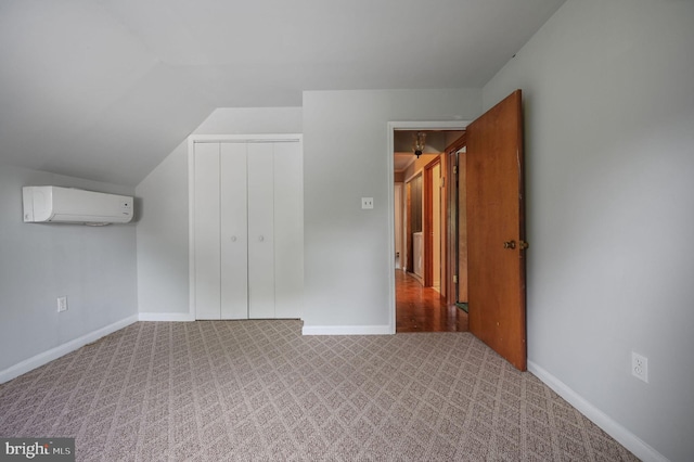 2814 Killens Pond Rd, Harrington, DE 19952 - bonus room featuring a wall mounted AC, carpet, baseboards, and lofted ceiling