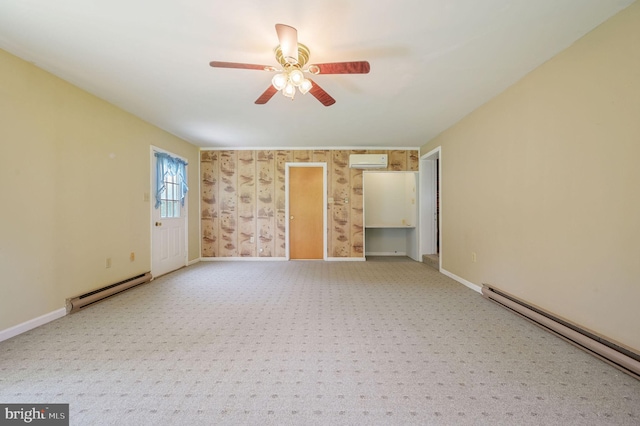 2814 Killens Pond Rd, Harrington, DE 19952 - unfurnished room with a baseboard heating unit, baseboard heating, an AC wall unit, and light carpet