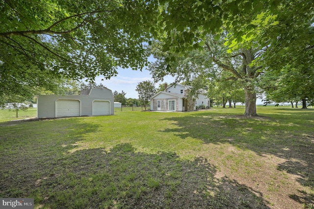 2814 Killens Pond Rd, Harrington, DE 19952 - view of yard with an outdoor structure and a detached garage