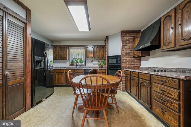 2814 Killens Pond Rd, Harrington, DE 19952 - kitchen with black appliances, custom exhaust hood, light floors, and a sink