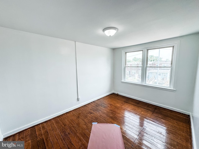 2714 N Pine St, Wilmington, DE 19802 - spare room with wood-type flooring and baseboards