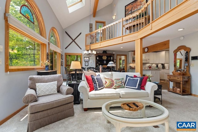 32 Stony Cove Ln, Wintergreen Resort, VA 22967 - living room with high vaulted ceiling, light colored carpet, baseboards, healthy amount of natural light, and a skylight