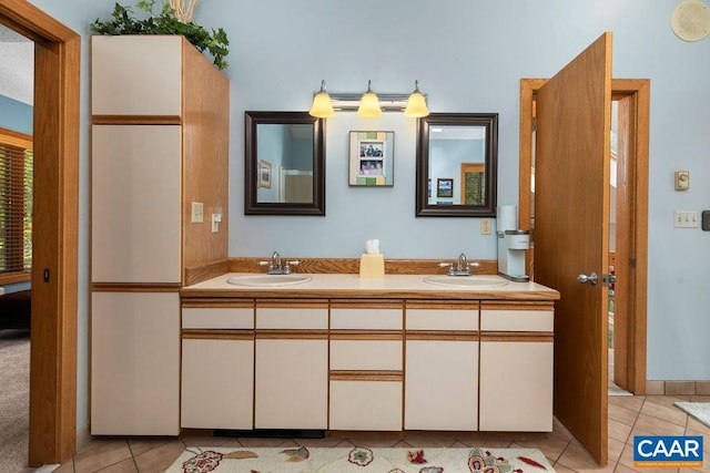 32 Stony Cove Ln, Wintergreen Resort, VA 22967 - bathroom featuring double vanity and tile patterned floors
