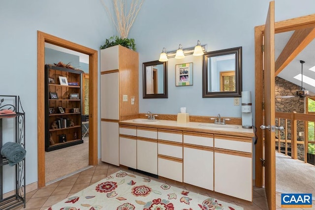 32 Stony Cove Ln, Wintergreen Resort, VA 22967 - bathroom with double vanity and tile patterned floors
