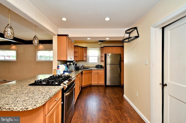 816 Margaret St, Reading, PA 19611 - kitchen featuring appliances with stainless steel finishes, a sink, a peninsula, open shelves, and dark wood-style floors