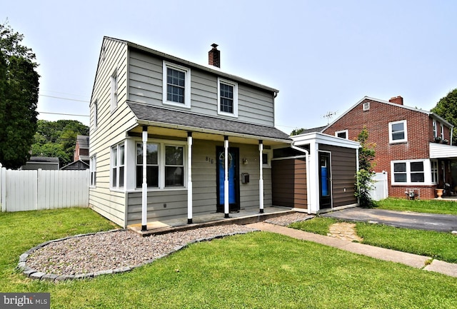 816 Margaret St, Reading, PA 19611 - view of front of home with a porch, a chimney, and roof with shingles