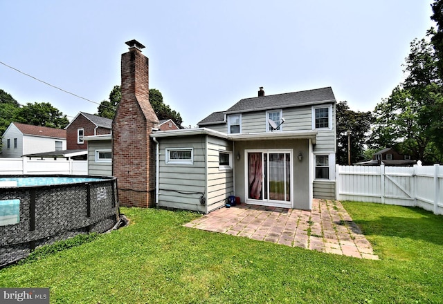 816 Margaret St, Reading, PA 19611 - back of house featuring a patio area