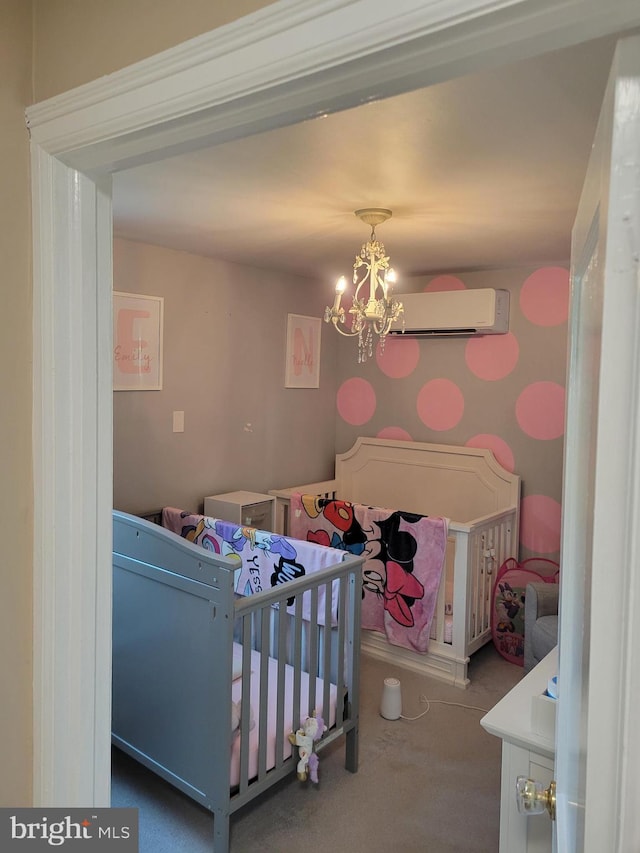 424 Exton Rd, Hatboro, PA 19040 - bedroom featuring a wall unit AC, carpet floors, a chandelier, and a nursery area